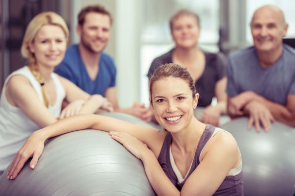 Group of diverse people in a pilates class