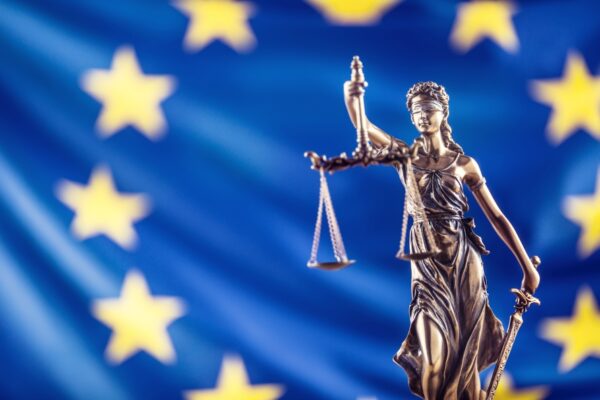 Lady Justice and European Union flag. Symbol of law and justice